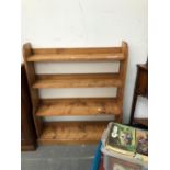 A PINE WATERFALL BOOKCASE OF FOUR OPEN SHELVES. W 88 x D 23 x H 101cms.