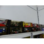 TWELVE BOXED BURAGO DIE CAST CARS