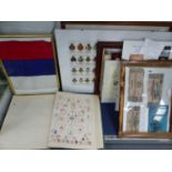 AN ALBUM OF LETTER CRESTS, A FRAME OF PAPER MONEY ANOTHER OF CAP BADGES, A FRAMED RED BLUE AND WHITE