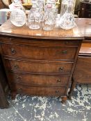 A 20th C. BURR WOOD CHEST WITH A BRUSHING SLIDE ABOVE FOUR DRAWERS AND CABRIOLE LEGS. W 64 x D