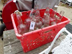 A COLLECTION OF LARGE VINTAGE GLASS BOTTLES