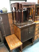 A 20th C. MAHOGANY BEDSIDE CUPBOARD WITH SHELF BELOW, A NEST OF THREE MAHOGANY TABLES AND ANOTHER