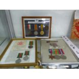 THREE FRAMES OF WWI AND WWII MEDALS TO INCLUDE A DEFENCE MEDAL