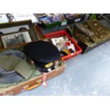 A KHAKI UNIFORM, FATIGUES, A NAVAL CAP, CLOTH BADGES AND OTHER MILITARIA