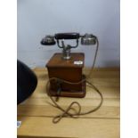 A VINTAGE MAHOGANY CASED TELEPHONE.