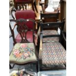 A PAIR OF VICTORIAN CARVED OAK ELBOW CHAIRS, A RED LEATHER UPHOLSTERED ELBOW CHAIR TOGETHER WITH A