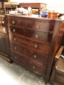 A 19th C. MAHOGANY ROUNDED FRONT CHEST OF TWO SHORT AND FOUR GRADED LONG DRAWERS EACH BETWEEN FLAT