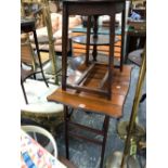 AN ARTS AND CRAFTS MAHOGANY TABLE WITH A SERPENTINE EDGED RECTANGULAR PLANK TOP TOGETHER WITH AN