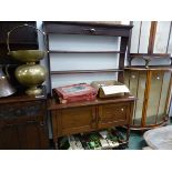 A MID 20th C. OAK DRESSER WITH OPEN THREE SHELF BACK, THE DOORS OF THE BASE EACH CENTRED BY A