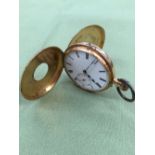 A CONTINENTAL 18ct STAMPED HALF HUNTER POCKET WATCH, ASSESSED AS 18ct GOLD, MONOGRAM ENGRAVED TO THE