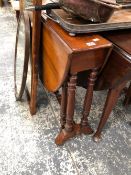 A 19th C. ROSE WOOD SUTHERLAND TABLE, THE OVAL TOP ON TURNED COLUMNS ENDING ON CASTER FEET. W 115