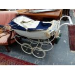 A SILVERCROSS VINTAGE DOLLS PRAM.