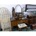 A MID 20th C. WALNUT FIVE DRAWER BOW FRONT DRESSING TABLE WITH THREE PANEL MIRROR BACK TOGETHER WITH
