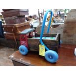 A VINTAGE CHILDS BRICK TROLLEY.