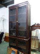 A 20th C. GLAZED MAHOGANY DISPLAY CASE, THE UPPER HALF WITH THREE SHELVES, THE LOWER WITH TWO. W
