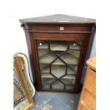 A 19th C. OAK CORNER CUPBOARD WITH AN ASTRAGAL GLAZED DOOR ENCLOSING SHELVES. W 78 x H 101cms.