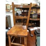 A VICTORIAN MAHOGANY TABLE WITH A PIE CRUST TOP ON THREE COLUMNS AND TRIPOD WITH BALL AND CLAW FEET.