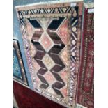 A PERSIAN TRIBAL RUG 274 x 160cms