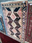 A PERSIAN TRIBAL RUG 274 x 160cms