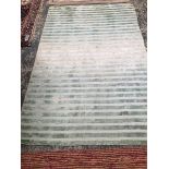 TWO CONTEMPORARY RUGS OF STRIPED DESIGN 237 x 171cms (LARGEST)