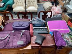 A COLLECTION OF HANDBAGS, CASES AND PENCIL CASES TO INCLUDE OAKLEY, CARTINOE ETC (11)