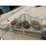 A TEAK GARDEN BENCH TOGETHER WITH A SIMILAR LOW TABLE