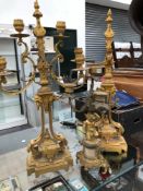 A PAIR OF 19th C. GILT CANDELABRA AND A FURTHER EXAMPLE WITH CHERUB SUPPORT