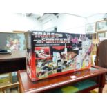 A VINTAGE BOXED TRANSFORMERS AUTOBOT BATTLE STATION METROPLEX.