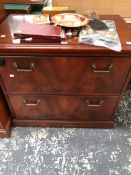 A MODERN MAHOGANY THREE DRAWER FILING CABINET TOGETHER WITH AN OFFICE CHEST OF TWO LONG DRAWERS. W