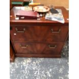 A MODERN MAHOGANY THREE DRAWER FILING CABINET TOGETHER WITH AN OFFICE CHEST OF TWO LONG DRAWERS. W