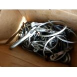 A LARGE QUANTITY OF UNUSED VINTAGE NAUTICAL CLASPS, IN CLEAVELAND OHIO BOXES.