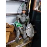 A VINTAGE MODEL OF A KNIGHT IN ARMOUR.