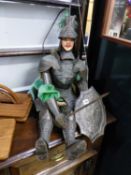 A VINTAGE MODEL OF A KNIGHT IN ARMOUR.