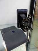 A BLUE LEATHER CASED KODAK GIRL GUIDE CAMERA