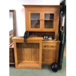 A MODERN OAK DRESSER AND A SIMILAR BOOKCASE