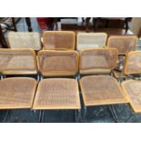 A SET OF SIX CANED CHAIRS TO INCLUDE ONE WITH ARMS AND TOGETHER WITH TWO SIMILAR CHAIRS, EACH