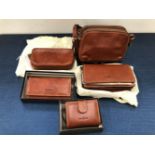 TWO GIANNO CONTI TAN CROSS BODY BAGS, TOGETHER WITH TWO PURSES AND A WRIST BAG (5)
