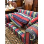 A SETTEE UPHOLSTERED IN RED, BLUE AND GREEN STRIPED MATERIAL. W 175cms.