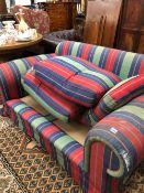 A SETTEE UPHOLSTERED IN RED, BLUE AND GREEN STRIPED MATERIAL. W 175cms.