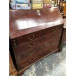 A GEORGE III MAHOGANY BUREAU, THE FALL ABOVE FOUR GRADED LONG DRAWERS AND BRACKET FEET. W 107 x D 52