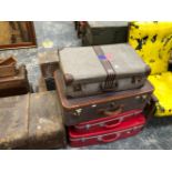 A CANVAS TRUNK TOGETHER WITH FOUR VINTAGE AND LATER SUITCASES