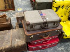 A CANVAS TRUNK TOGETHER WITH FOUR VINTAGE AND LATER SUITCASES