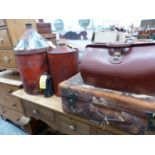 THREE VINTAGE FUEL CANS, A LEATHER SUITCASE AND A BRIEF CASE.