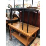 A TEAK TWO TIER TROLLEY TOGETHER WITH THREE TILE TOPPED IRON OCCASIONAL TABLES AND A WALL MIRROR