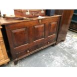 AN 18th C. OAK MULE CHEST, THE THREE PANELLED FRONT OVER TWO SHORT DRAWERS AND THE STILE FEET. W 137