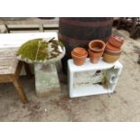 A STADDLE STONE, BELFAST SINK, TERRACOTTA POTS ETC