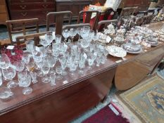 A QUANTITY OF VARIOUS SILVER PLATED WARES, CUT CRYSTAL INCLUDING STUART AND OTHER GLASSWARE.