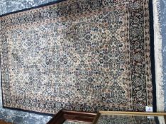 A MACHINE MADE RUG OF PERSIAN TABRIZ DESIGN 190 x 126 cms