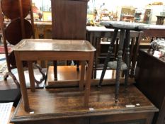 A DAMASCENED COPPER TRAY MOUNTED ON MAHOGANY LEGS AS A COFFEE TABLE TOGETHER WITH AN INDIAN CHIP