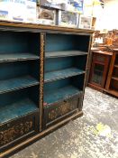 A 19th C. EBONISED OPEN BOOK CASE GILT WITH FOLIAGE BANDS BETWEEN TO TWO BANKS OF THREE BLUE SHELVES